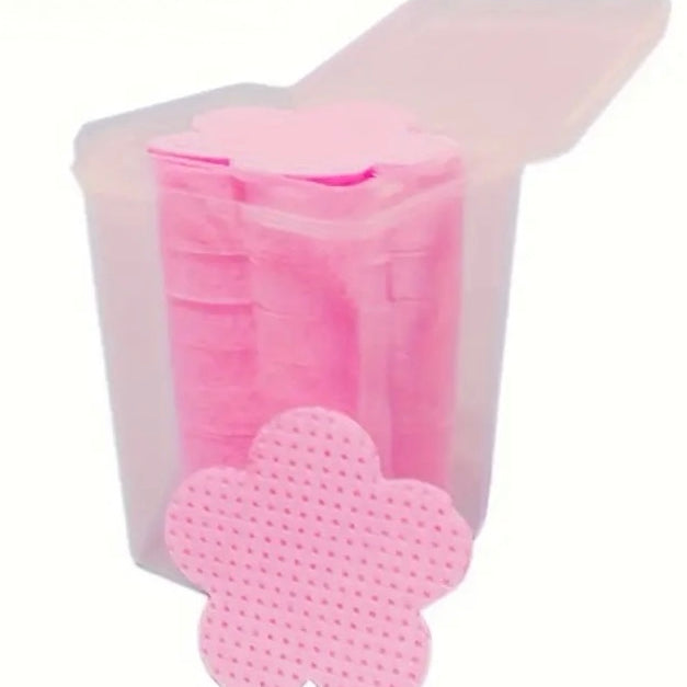 Adhesive nozzle wipes